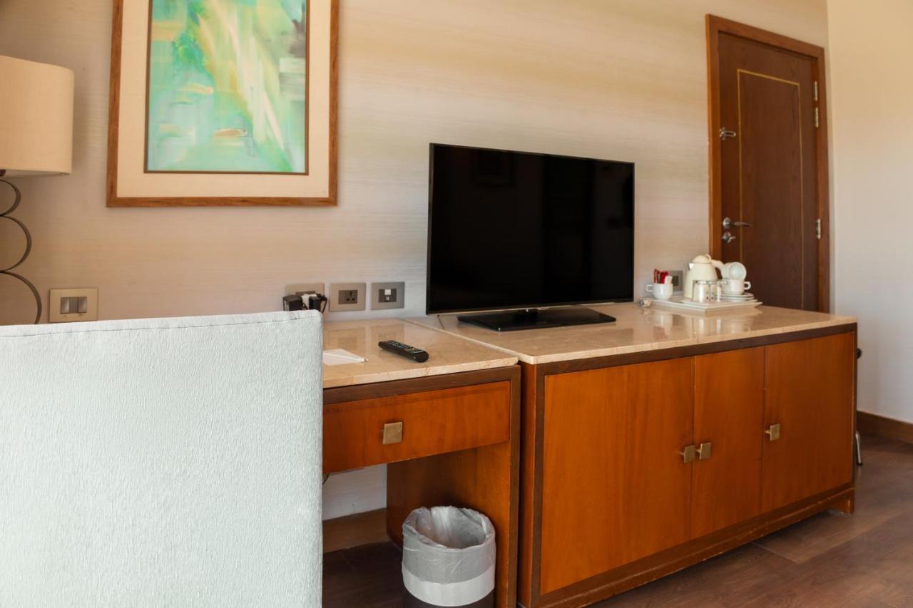 ホテル Sharm Dreams Vacation Club - Aqua Park エクステリア 写真 A television in a hotel room