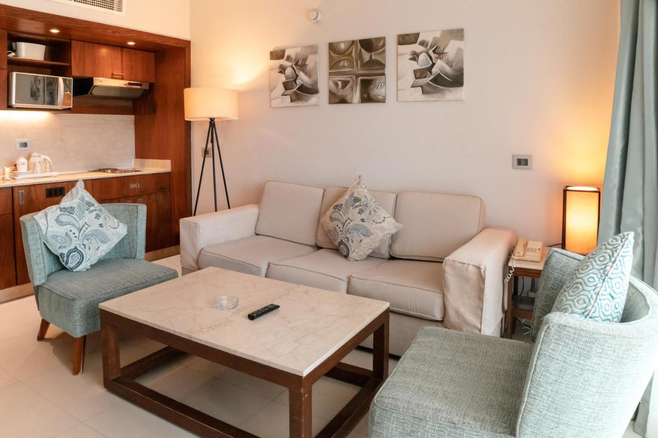 ホテル Sharm Dreams Vacation Club - Aqua Park エクステリア 写真 A living room in a hotel
