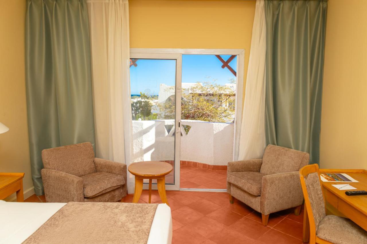 ホテル Sharm Dreams Vacation Club - Aqua Park エクステリア 写真 A room at the hotel